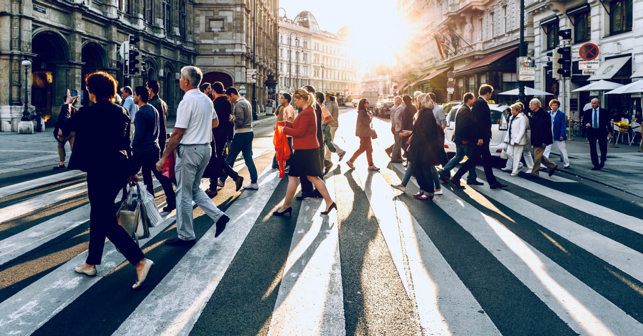 a group of people walking, nearly half of Americans think moral values are low
