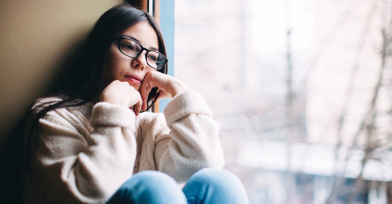 sad woman with seasonal depression, what is seasonal affective disorder