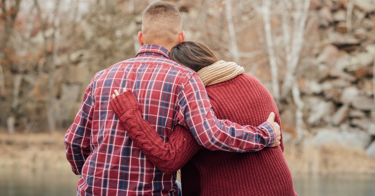 couple console caring hug grief love