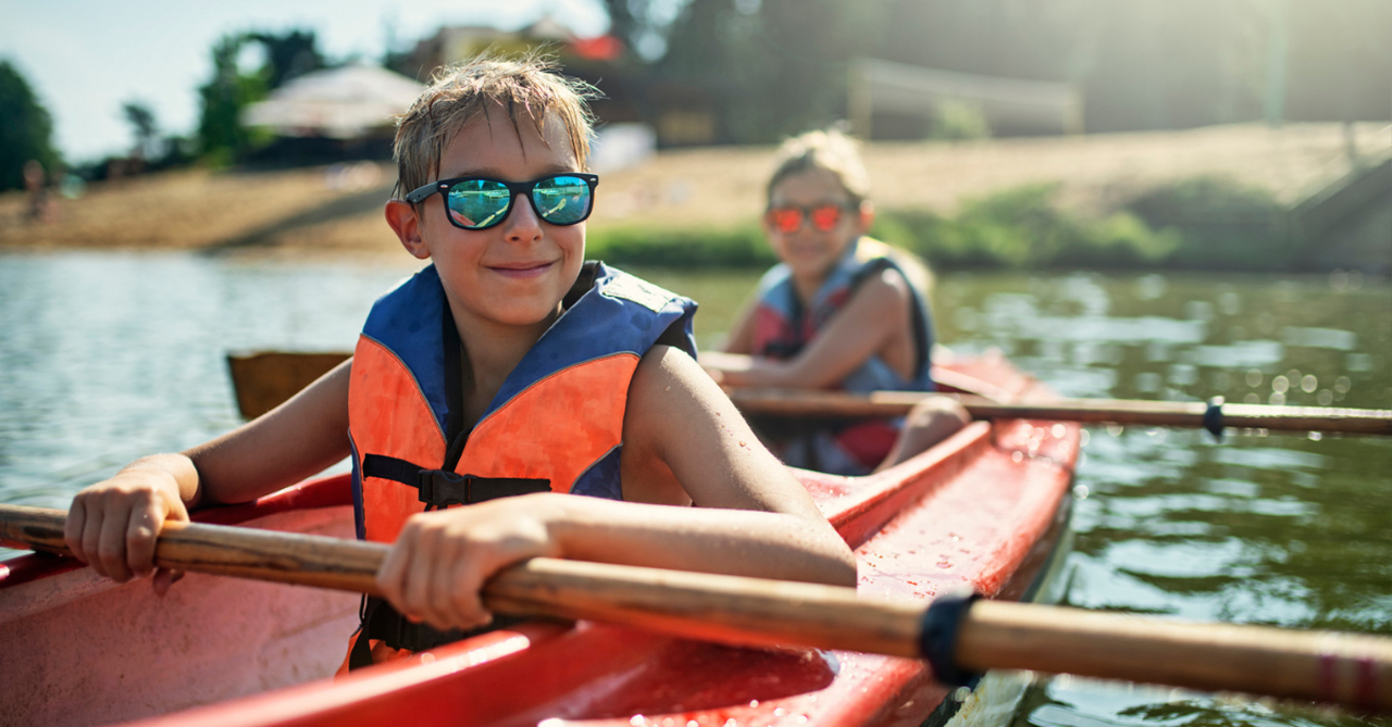 Tweens Kayaking at Summer Camp; sending your child to their first youth camp.